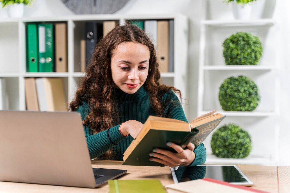 medium-shot-smiley-girl-studying-with-dictionary_23-2148389045